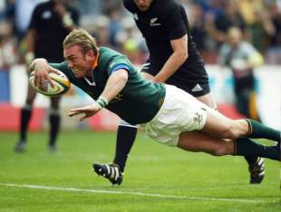 Springbok Marius Joubert dives in for one of his hat-trick of tries against New Zealand, South Africa v New Zealand, Tri Nations, Ellis Park, August 14 2004.