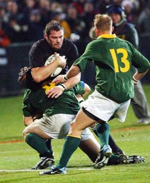 Reuben Thorne is stopped short of the line by Juan Smith of South Africa, New Zealand v South Africa, Tri Nations, Carisbrook, August 9 2003.