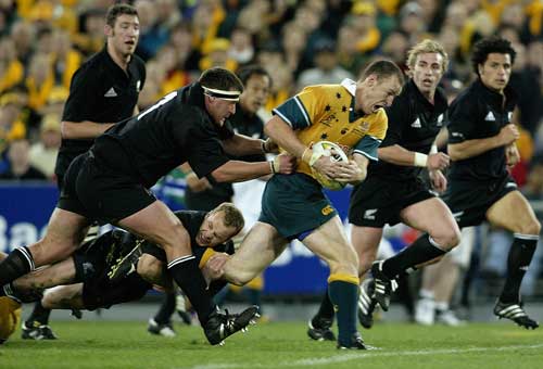 Stirling Mortlock breaks through the New Zealand defence