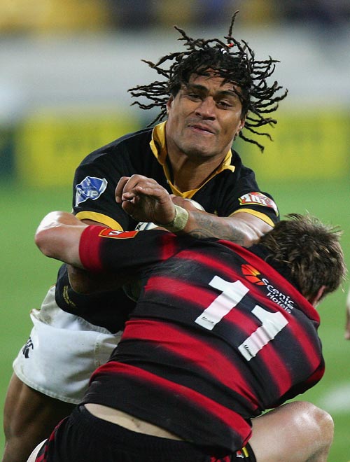 Rodney So'oialo of the Lions runs into Steven Yates of Canterbury