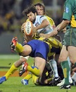 Racing scrum-half Jerome Fillol is wrapped up by the Clermont defence