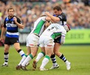 Bath's Olly Barkley is driven back by Ceiron Thomas and Andy Titterell