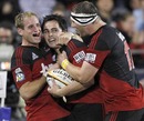 The Crusaders' Zac Guildford is congratulated after scoring