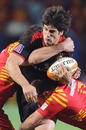 Toulouse fly-half David Skrela is wrapped up