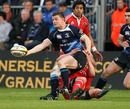 Leinster's Brian O'Driscoll off loads the ball under pressure