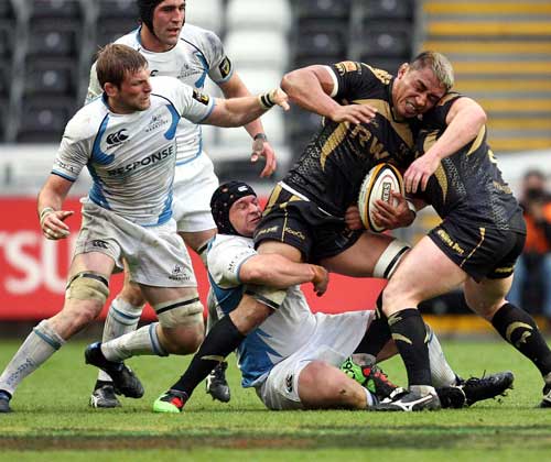Ospreys flanker Jerry Collins looks to force an opening