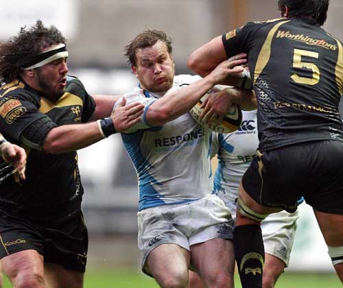 Glasgow's Fergus Thomson is shackled by the Ospreys