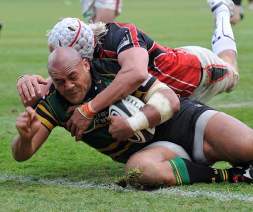 Northampton's Soane Tonga'uiha crashes over for a try