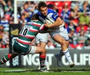 Bath's Olly Barkley is tackled by Leicester's Toby Flood