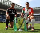 Toulouse's Thierry Dusautoir and Biarritz's Jerome Thion pose with the Heineken Cup