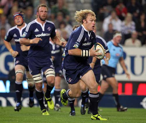 Stormers skipper Schalk Burger takes the attack to the Waratahs