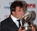 Saracens' Schalk Brits kisses the RPA Player of the Year award
