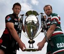 Saracens No.8 Ernst Joubert and Leicester skipper Geordan Murphy pose with the Guinness Premiership trophy