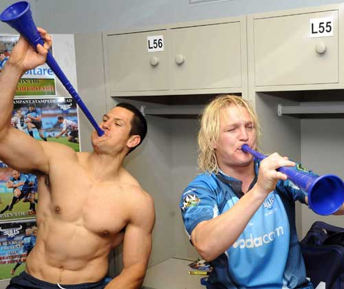 The Bulls' Pierre Spies and Dewald Potgieter celebrate winning the Super 14