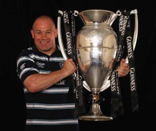 Leicester head coach Richard Cockerill poses with the Guinness Premiership silverware