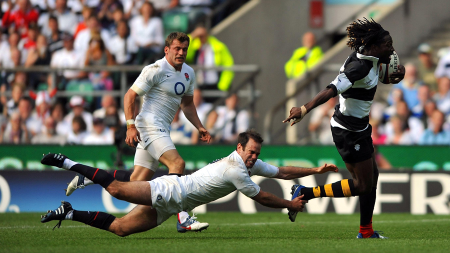 Barbarians winger Paul Sackey scores against England