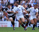 England's Nick Easter takes the game to the Barbarians