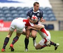 Scotland's Colin Shaw is tackled by England's James Rodwell and Rob Vickerman 