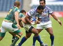 Samoa's Reupena Levasa stretches the South Africa defence