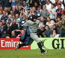 Batman swoops to the crowd's delight at the IRB Sevens