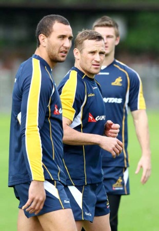 Australia's Quade Cooper and Matt Giteau look on during training at Moore Park, Sydney, Australia, June 1, 2010