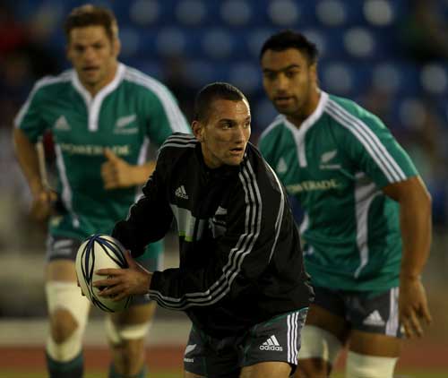 New All Black Aaron Cruden prepares to pass during training 