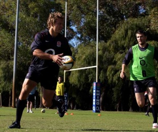 Jonny Wilkinson looks for an offload during England training at the McGillivray Oval, Perth, Australia, June 4, 2010