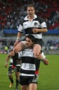Barbarians halfback Jean-Baptiste Elissalde is chaired from the field