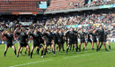 New Zealand players demonstrate the Haka prior to their opening match against Fiji 