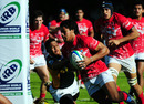 Tonga's Seilame Tuku'afu scores against South Africa