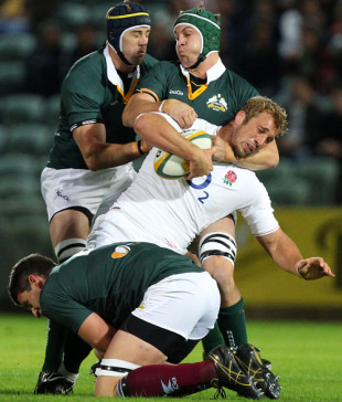 Stephen Hoiles of the Barbarians tackles Chris Robshaw of England during the match between the Australian Barbarians and England, Members Equity Stadium, Perth, June 8, 2010