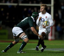 Stephen Hoiles tackles Matthew Tait during the match between the Australian Barbarians and England 