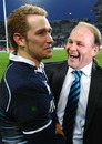 Scotland fly-half Dan Parks is congratulated by coach Andy Robinson