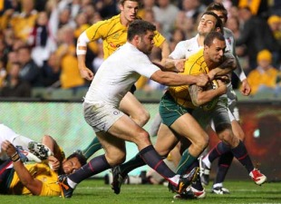 Wallabies fly-half Quade Cooper crashes over to score his second try, Australia v England, Subiaco Oval, Perth, Australia, June 12, 2010