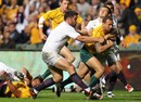 Wallabies fly-half Quade Cooper crashes over to score his second try