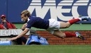 France wing Aurelien Rougerie dives in to score