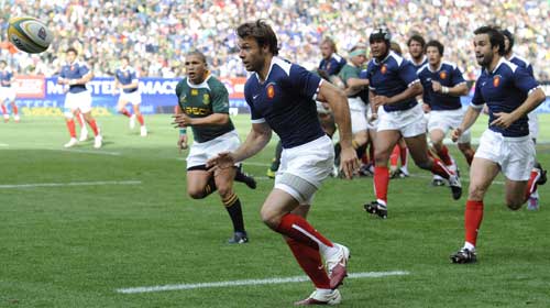 France wing Vincent Clerc sets off in pursuit of a loose ball