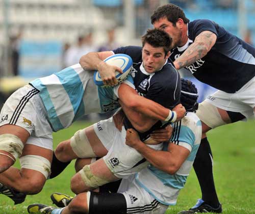 Scotland's Hugo Southwell is tackled by the Argentina defence