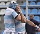 Argentina's Juan Manuel Leguizamon congratulates Gonzalo Tiesi on a try