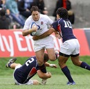 England Saxons centre Brad Barritt is tackles by the USA defence