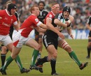 New Zealand U20s captain Tyler Bleyendaal is tackled by the Wales defence