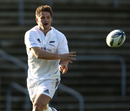 Richie McCaw spins out a pass during training in Dunedin