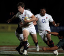 England's Dominic Waldouck looks for a gap against the Australian Barbarians in Gosford
