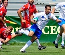 Italy 'A' fly-half Luciano Orquera stretches the Georgia defence