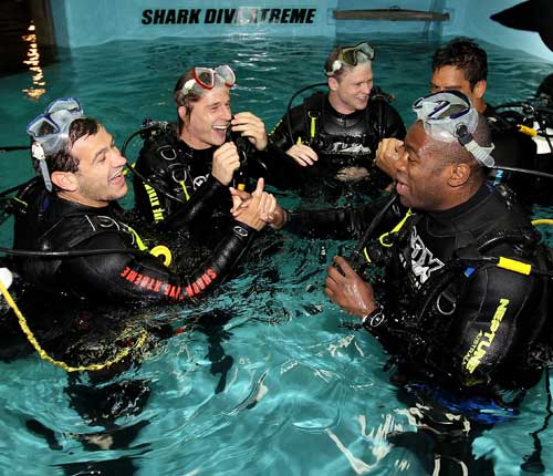 England's Danny Care, David Strettle, Chris Ashton, Shontayne Hape and Ugo Monye joke after diving with sharks