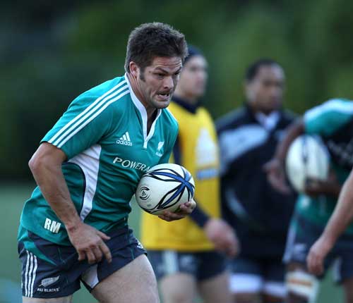 New Zealand skipper Richie McCaw charges forward with the ball