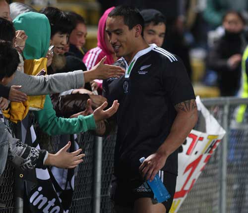 New Zealand Maori wing Hosea Gear celebrates with fans after victory over Ireland