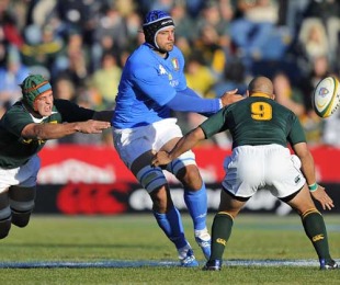 Italy's Marco Bortolami off loads the ball under pressure, South Africa v Italy, Puma Stadium, Witbank, South Africa, June 19, 2010