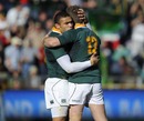 South Africa's Bryan Habana and Butch James celebrate victory