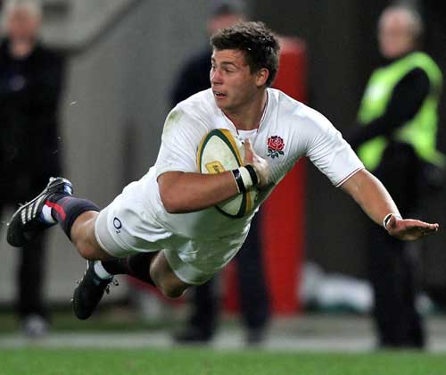 Scrum-half Ben Youngs dives in to score England's first try